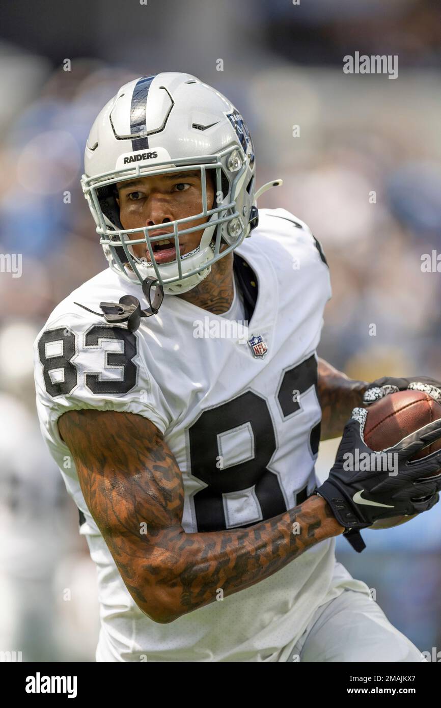 Tight end (83) Darren Waller of the Las Vegas Raiders warms up before  playing against the Los Angeles Chargers in an NFL football game, Sunday,  Sept. 11, 2022, in Inglewood, Calif. Chargers