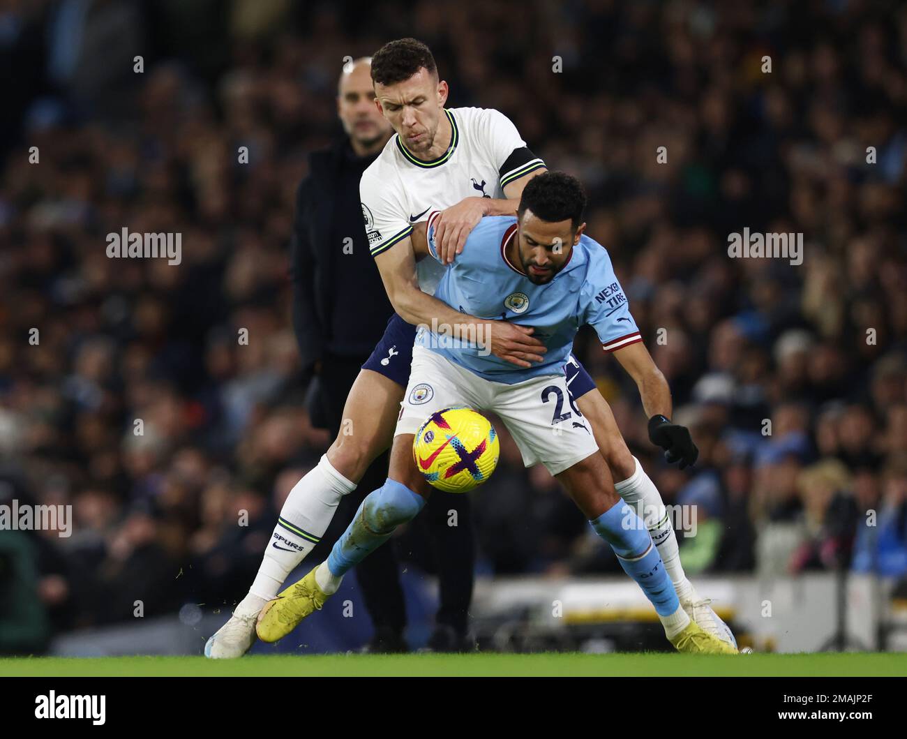 Manchester, UK. 19th January 2023.  Ivan Perisic of Tottenham tackles Riyad Mahrez of Manchester City during the Premier League match at the Etihad Stadium, Manchester. Credit: Sportimage/Alamy Live News Stock Photo