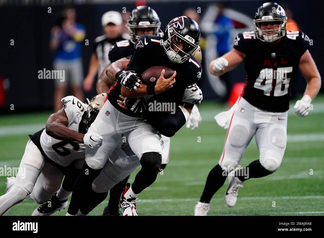 New Orleans Saints safety Marcus Maye (6) hits Atlanta Falcons quarterback  Marcus Mariota (1) during the first half of an NFL football game, Sunday,  Sept. 11, 2022, in Atlanta. (AP Photo/John Bazemore