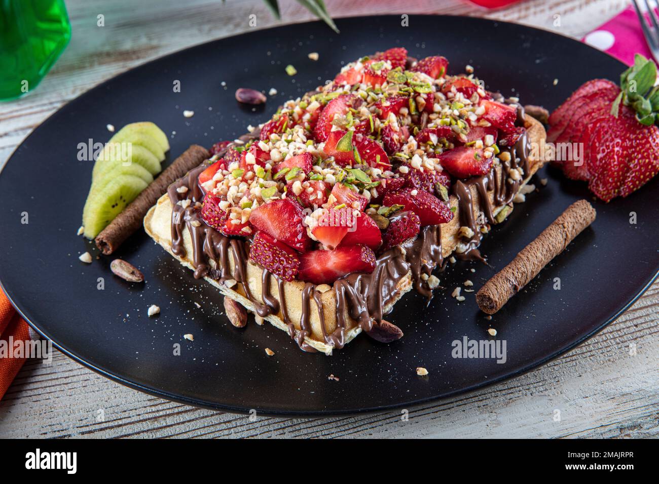 Traditional Belgian waffles with fresh fruit and whipped cream Stock ...
