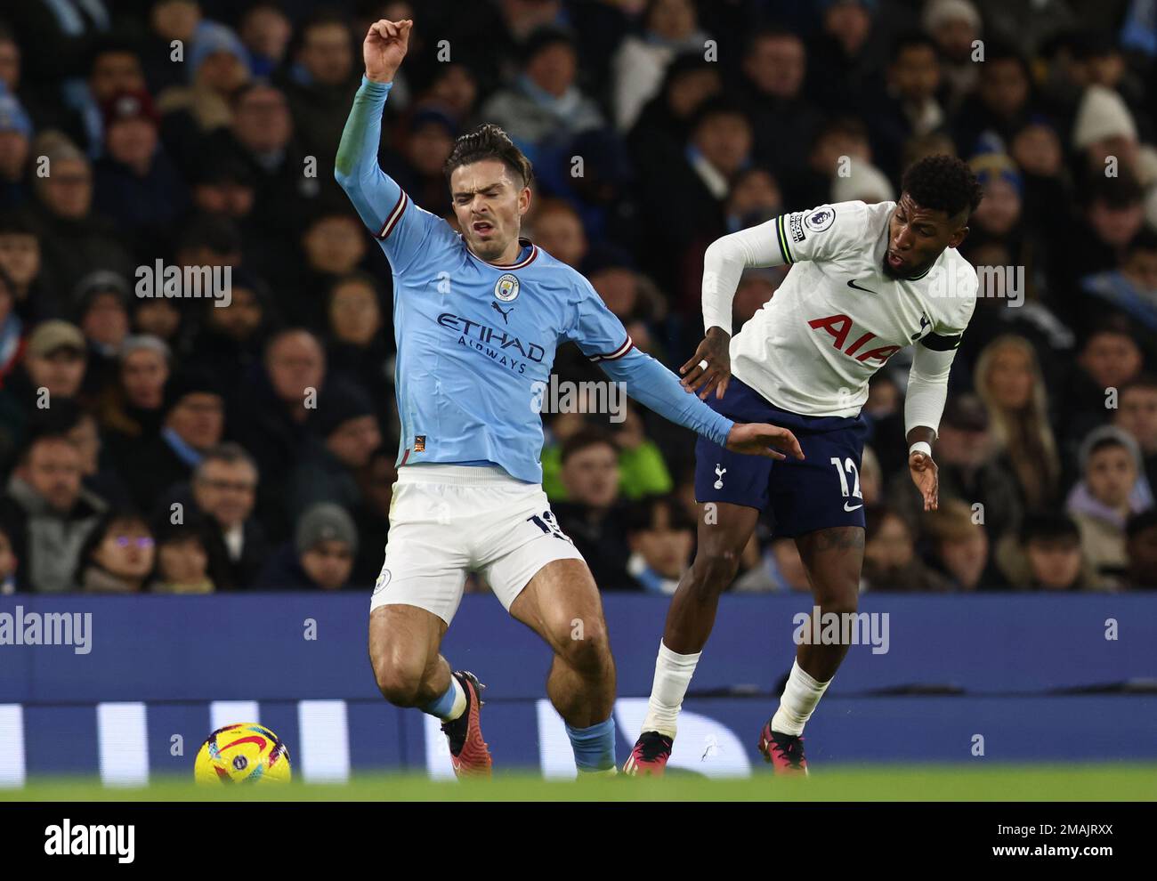 Manchester, UK. 19th January 2023.  Jack Grealish of Manchester City tackled by Emerson of Tottenham during the Premier League match at the Etihad Stadium, Manchester. Credit: Sportimage/Alamy Live News Stock Photo