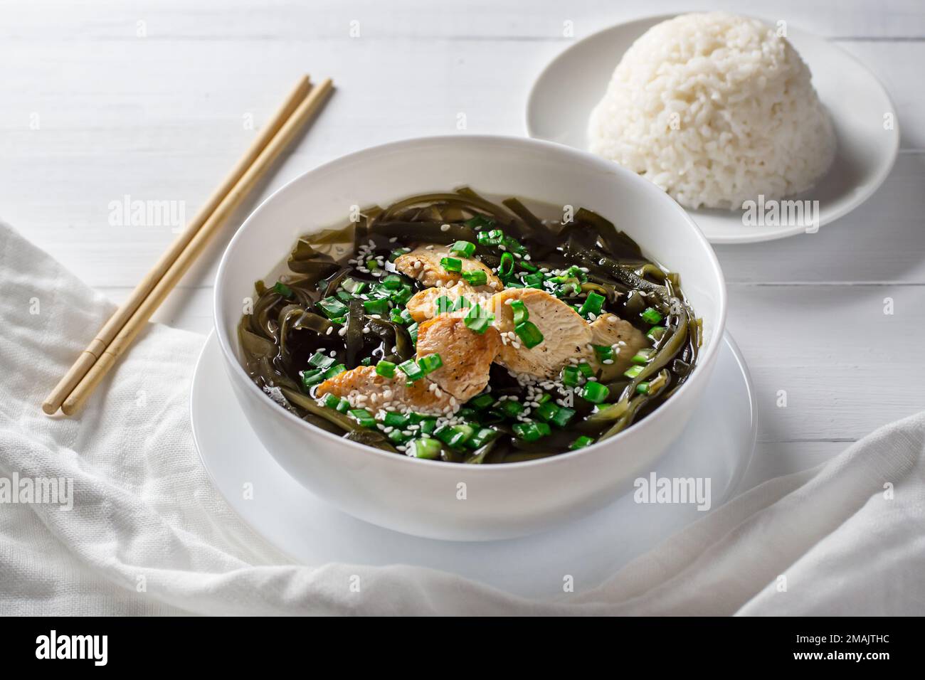 Korean seaweed soup with meat in a white bowl and boiled rice. Birthday