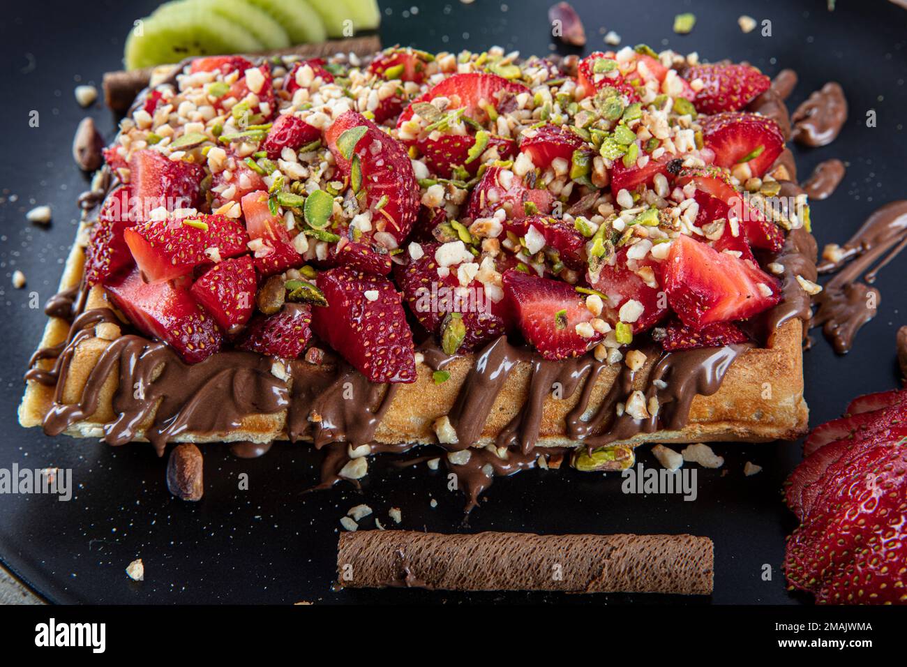 Traditional Belgian waffles with fresh fruit and whipped cream Stock ...