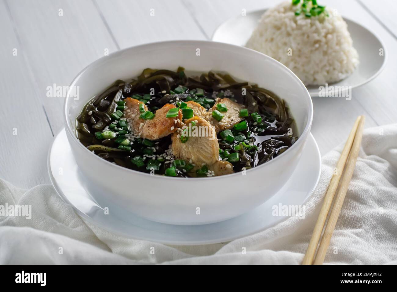 Korean seaweed soup with meat in white bowl and boiled rice. Birthday