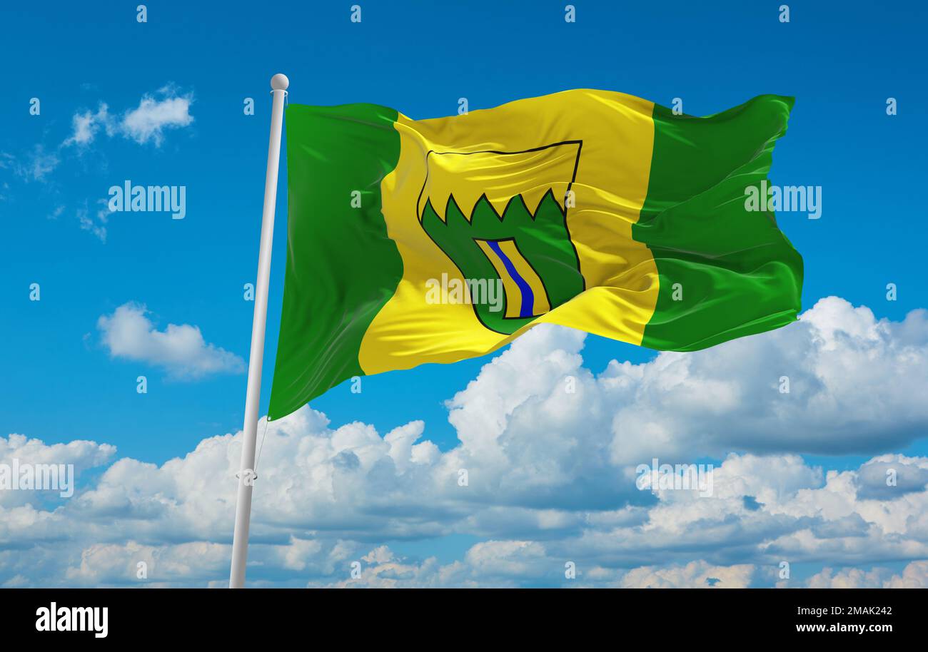 official flag of Kimberley, British Columbia Canada at cloudy sky background on sunset, panoramic view. Canadian travel and patriot concept. copy spac Stock Photo