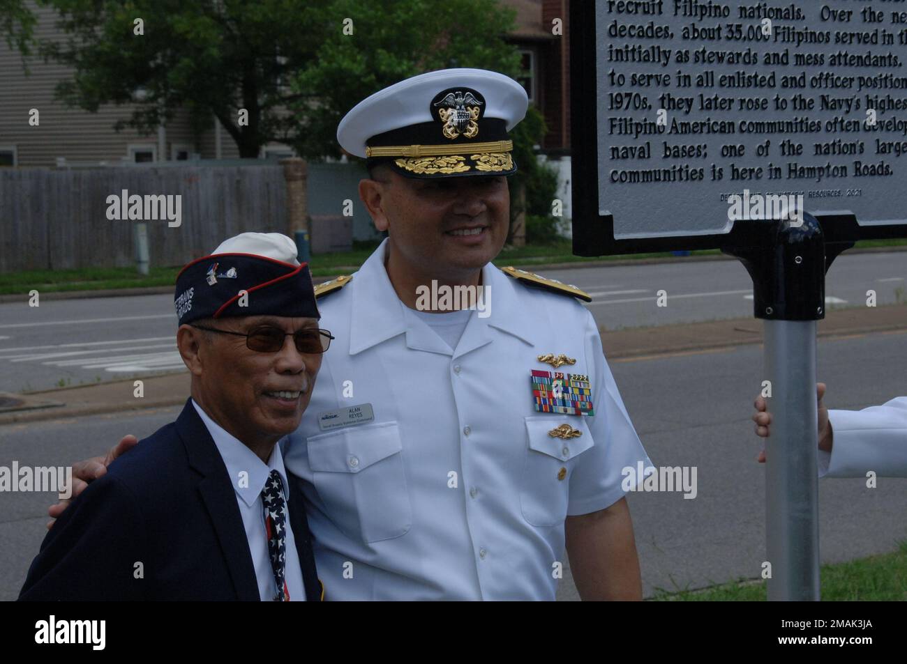 RADM Alan Reyes, Deputy Commander, Naval Supply Systems Command, stops ...