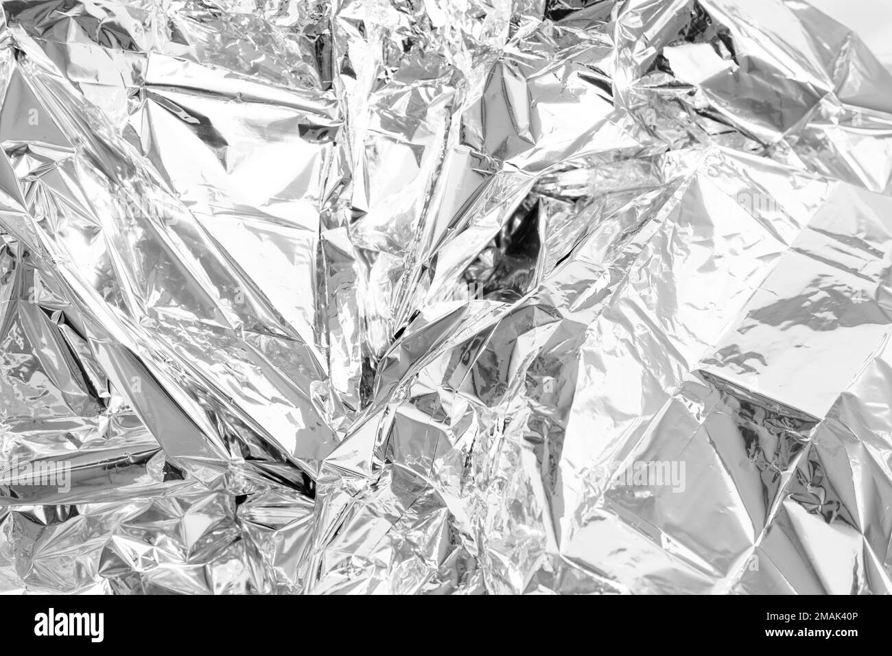 full frame creased silver foil background Stock Photo Alamy