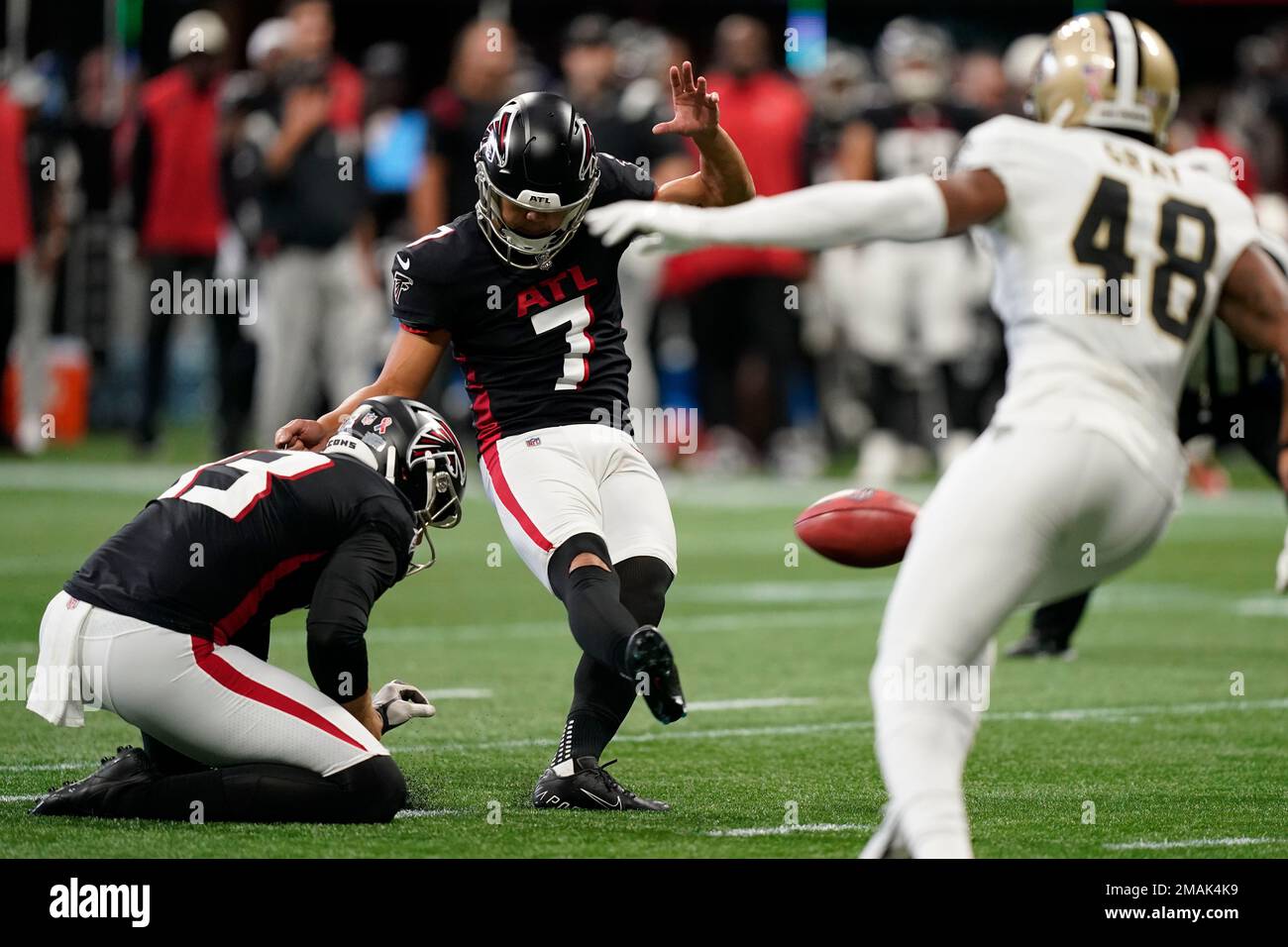 Atlanta Falcons place kicker Younghoe Koo, of South Korea, (7) kicks a