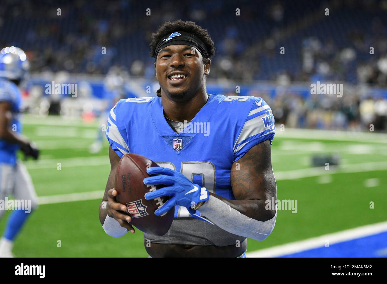 Detroit Lions running back Jamaal Williams smiles while playing catch with  fans before an NFL football game against the Philadelphia Eagles in Detroit,  Sunday, Sept. 11, 2022. (AP Photo/Lon Horwedel Stock Photo 