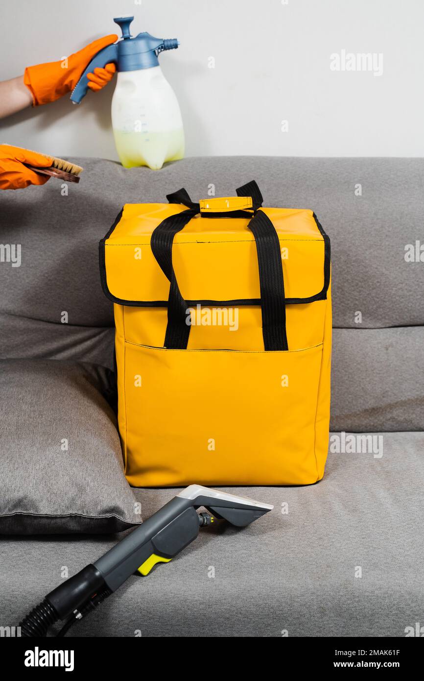 Extractor dry cleaning machine and detergent for removing stains and