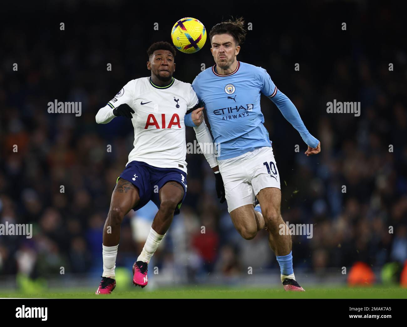 Manchester, UK. 19th January 2023. Emerson of Tottenham tussles with Jack Grealish of Manchester City during the Premier League match at the Etihad Stadium, Manchester. Credit: Sportimage/Alamy Live News Stock Photo