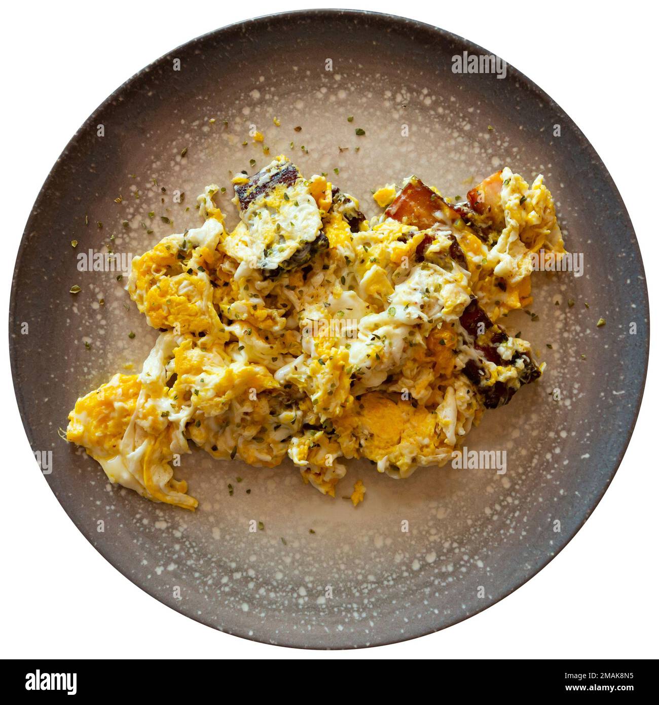 Plate with scrambled egg and bacon on white background Stock Photo - Alamy