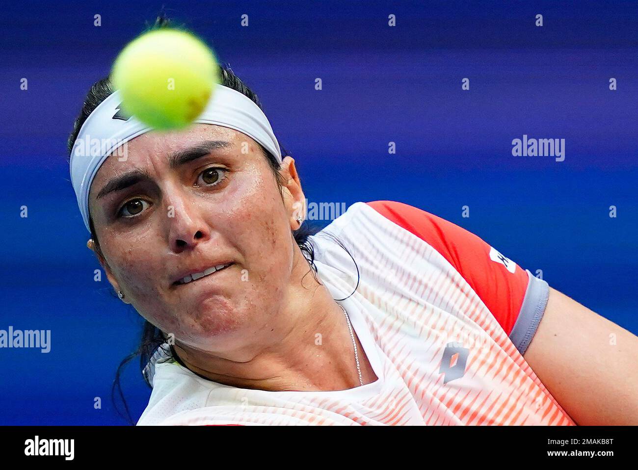 Ons Jabeur, of Tunisia, returns a shot to Iga Swiatek, of Poland, during the womens singles final of the U.S. Open tennis championships, Saturday, Sept