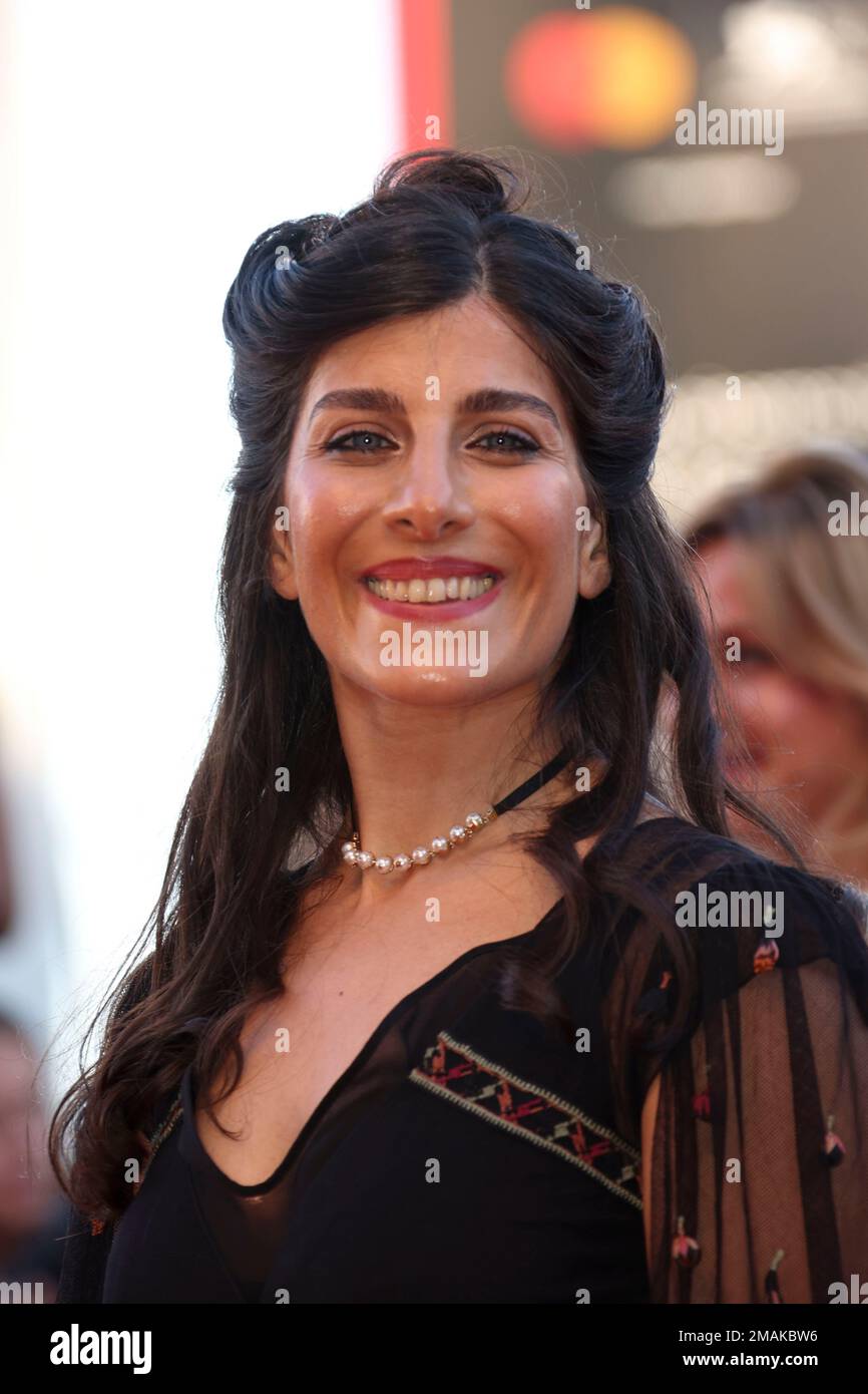 Mina Khosravani poses for photographers upon arrival at the premiere of