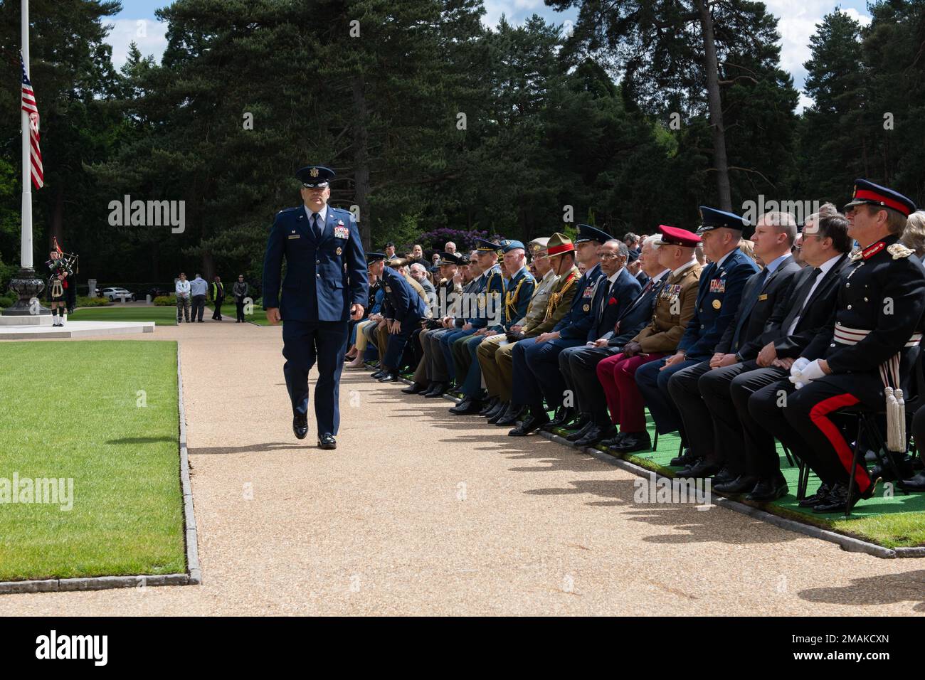 U.S. Air Force Col. Brian Filler, 501st Combat Support Wing commander, prepares to lay a wreath during a Memorial Day ceremony at the Brookwood American Military Cemetery, England, May 29, 2022. Memorial Day provides us a solemn opportunity to remember our fallen brothers and sisters in arms, reflect upon their courageous sacrifice, and show gratitude for the freedom they gave their lives to defend. It also affords us the opportunity to pay homage to those families who lost their loved ones in service to the Nation-and continue to feel the full weight of that sacrifice today. Stock Photo