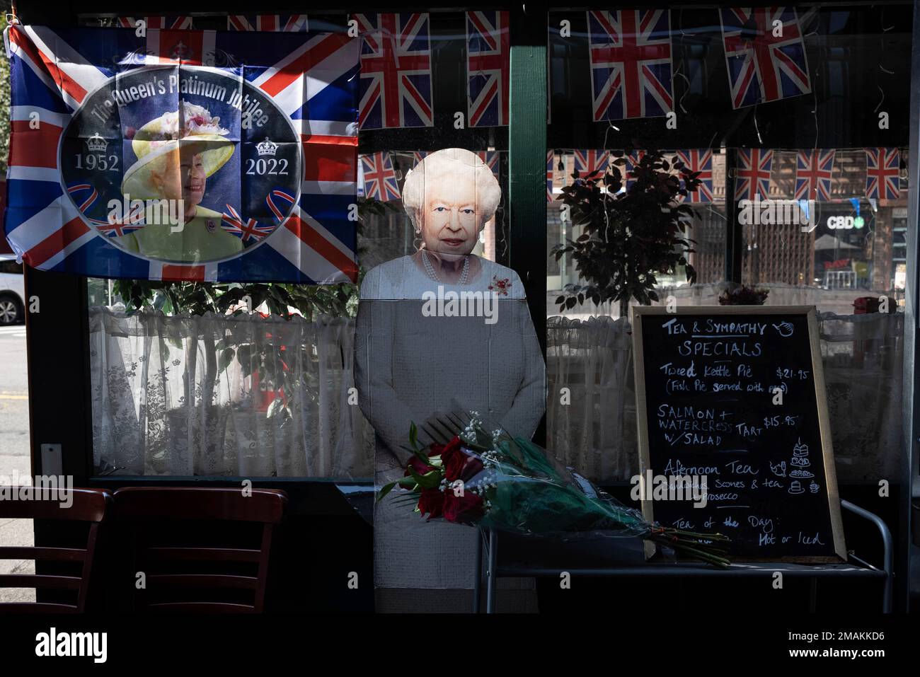 A cutout print of Britain's longestserving monarch Queen Elizabeth II