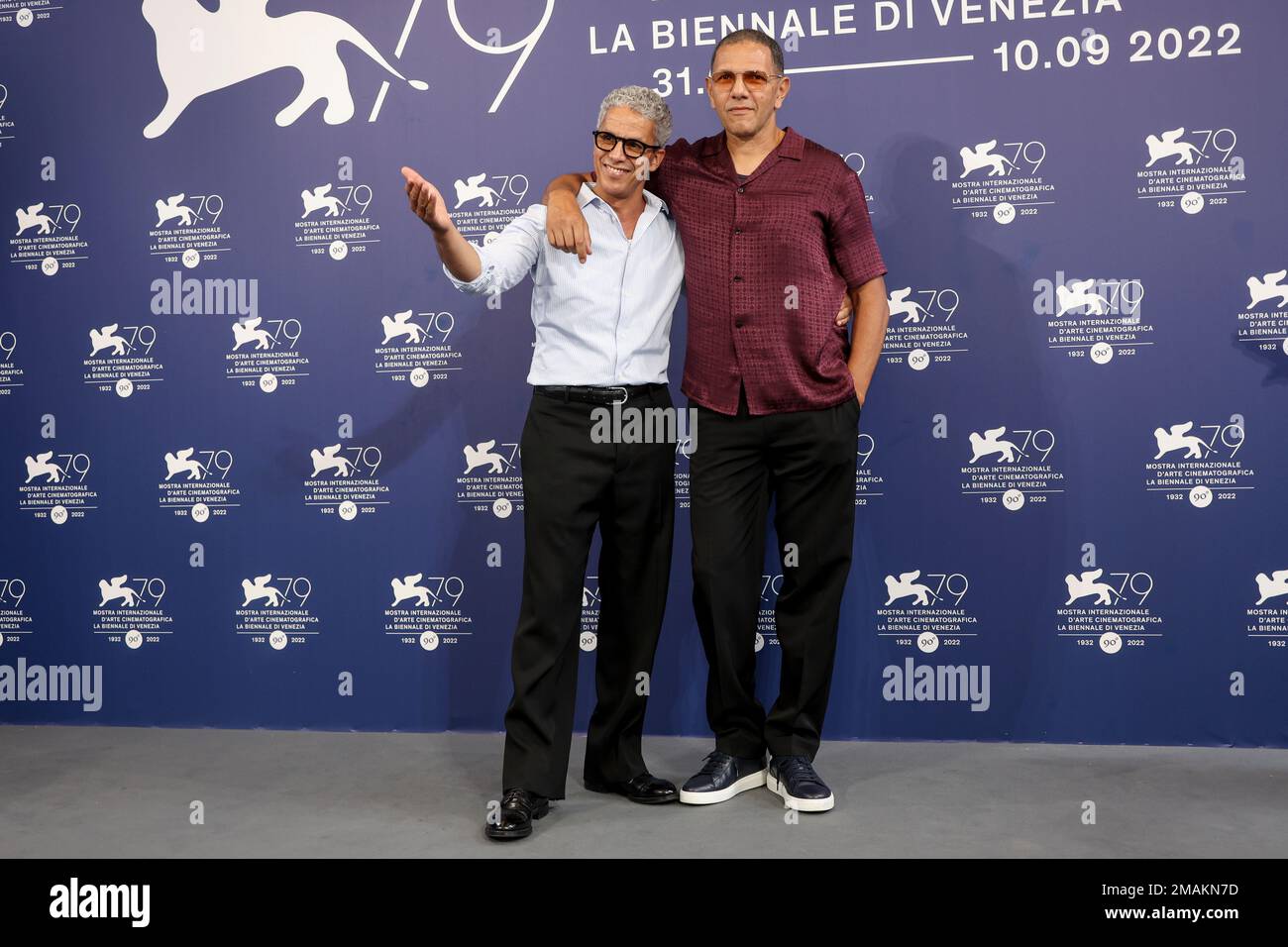 Sami Bouajila, left, and director Roschdy Zem pose for photographers at the  photo call for the film 'Les Miens' during the 79th edition of the Venice Film  Festival in Venice, Italy, Friday,