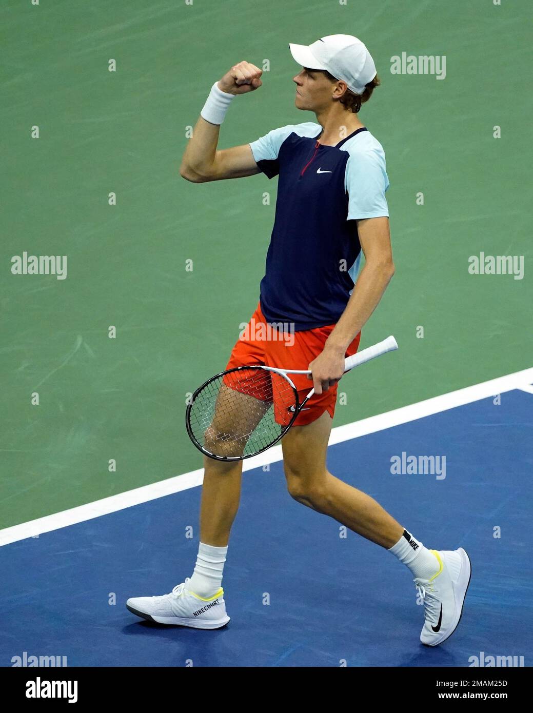 Jannik Sinner, of Italy, celebrates after winning a point against Carlos Alcaraz, of Spain, during the quarterfinals of the U.S. Open tennis championships, Wednesday, Sept