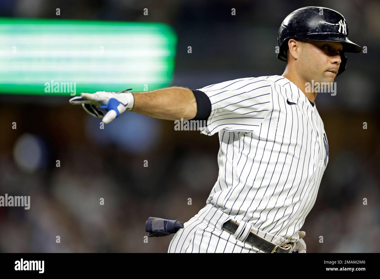 New York Yankees' Isiah Kiner-Falefa reacts after hitting a grand slam  during the fourth inning of the second baseball game of a doubleheader  against the Minnesota Twins on Wednesday, Sept. 7, 2022