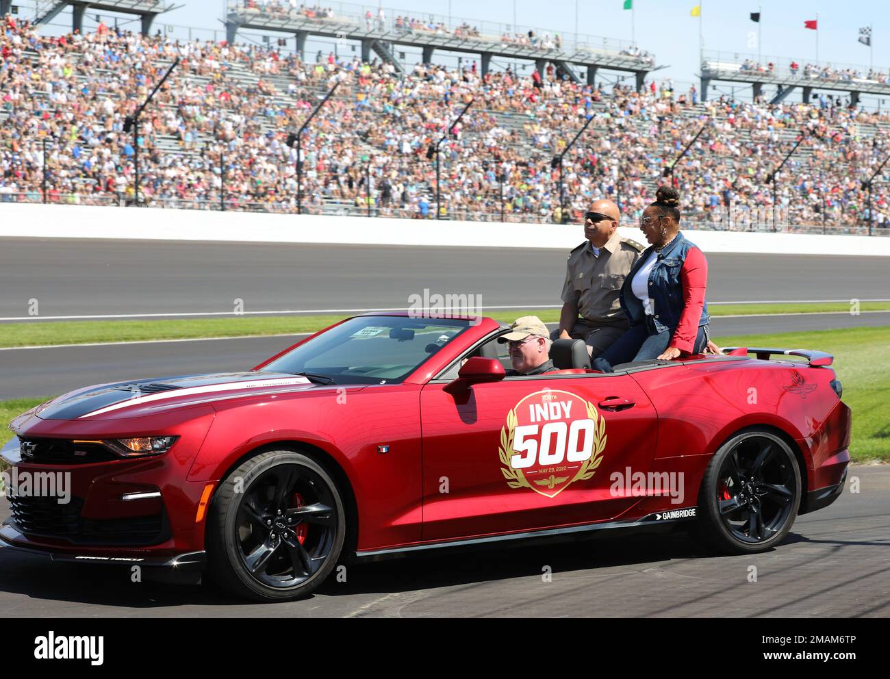 The Adjutant General of Ohio, Maj. Gen. John C. Harris Jr., and his wife, Angela, prepare to take a lap around the track during pre-race ceremonies for the Indy 500 at the Indianapolis Motor Speedway, May, 29, 2022. Stock Photo