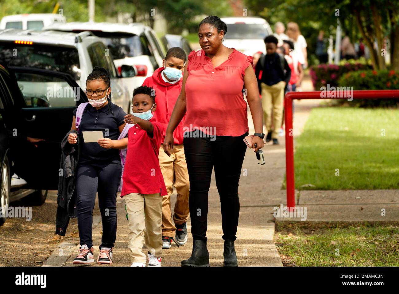 Spann Elementary School principal Lori G. Torrey, right, leads a