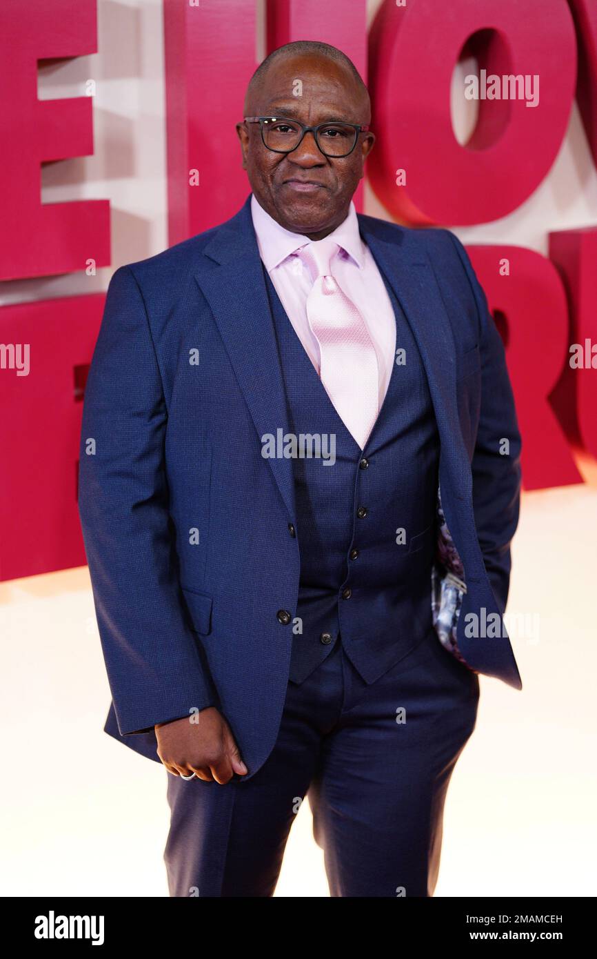 Lucian Msamati poses for photographers upon arrival at the London