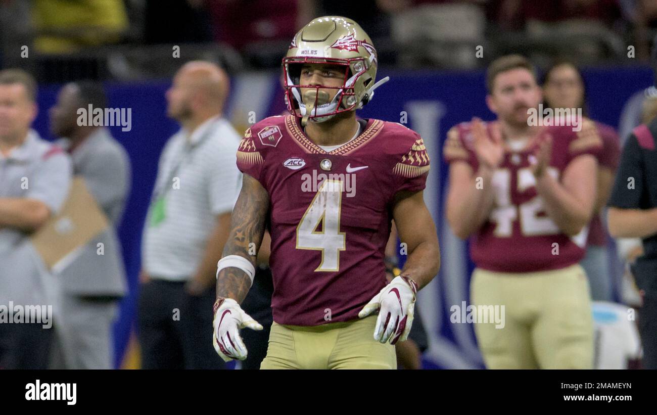 Florida State wide receiver Mycah Pittman (4) lines up during the