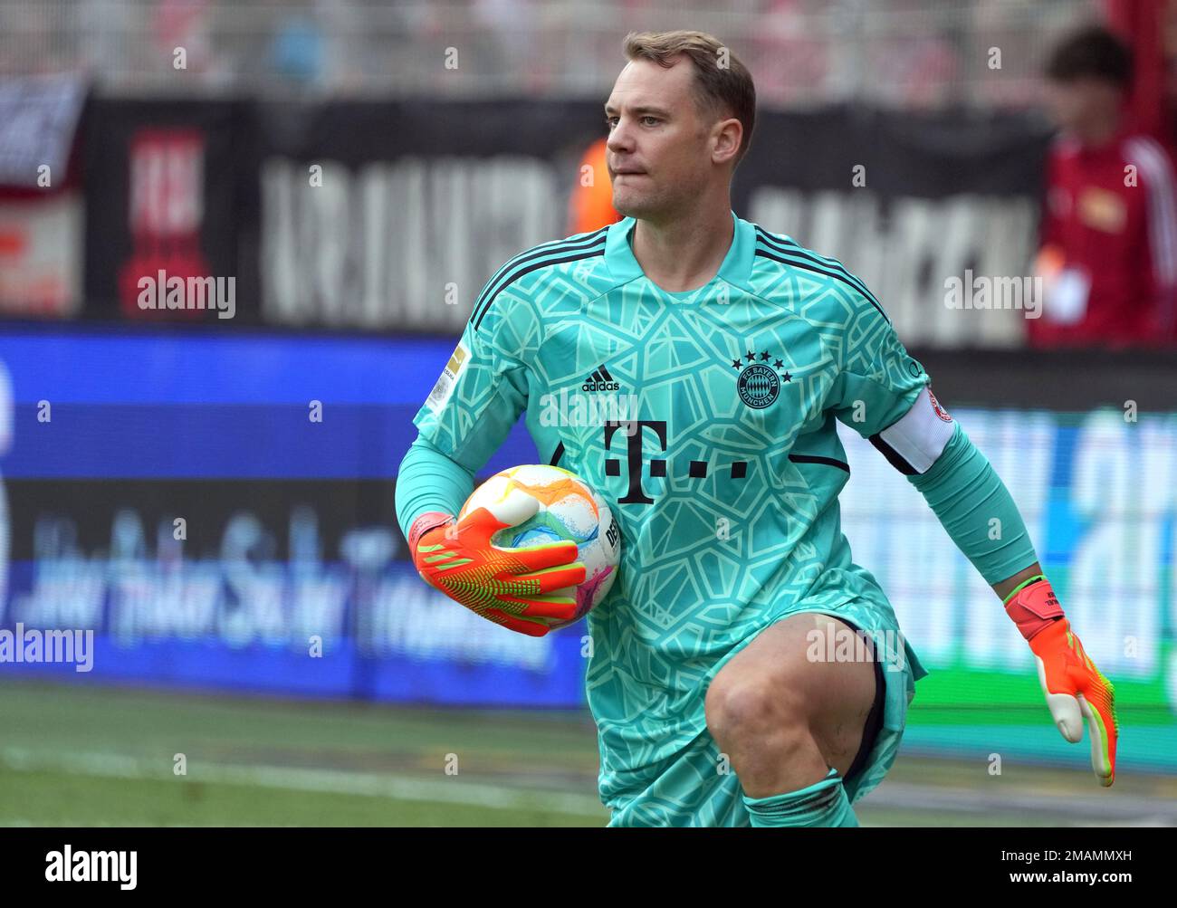 Bayern's goalkeeper Manuel Neuer holds the ball during the German Bundesliga  soccer match between 1. FC Union Berlin and FC Bayern Munich in Berlin,  Germany, Saturday, Sept. 3, 2022. (AP Photo/Michael Sohn