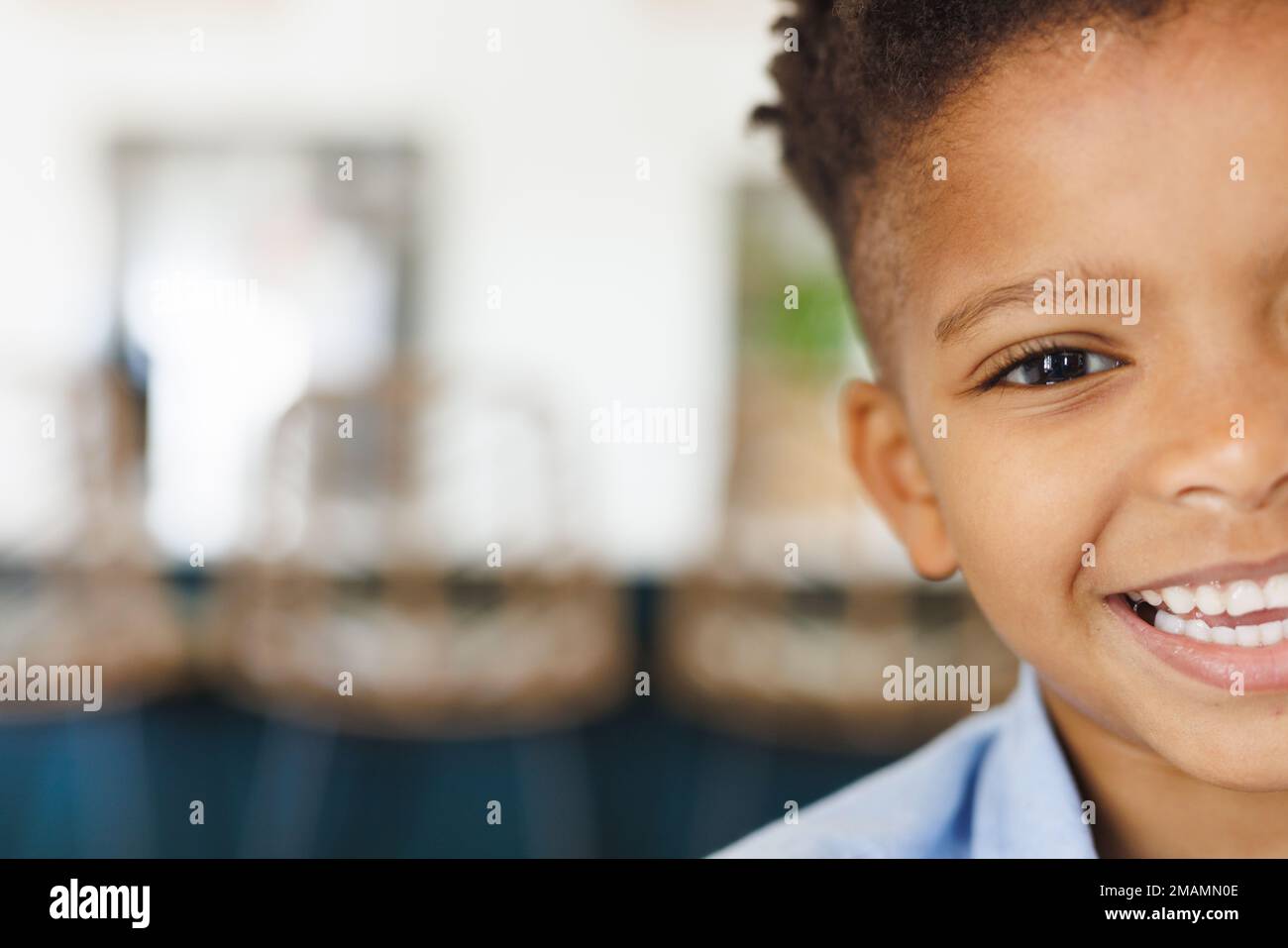 Portrait of happy african american boy looking at camera and smiling ...