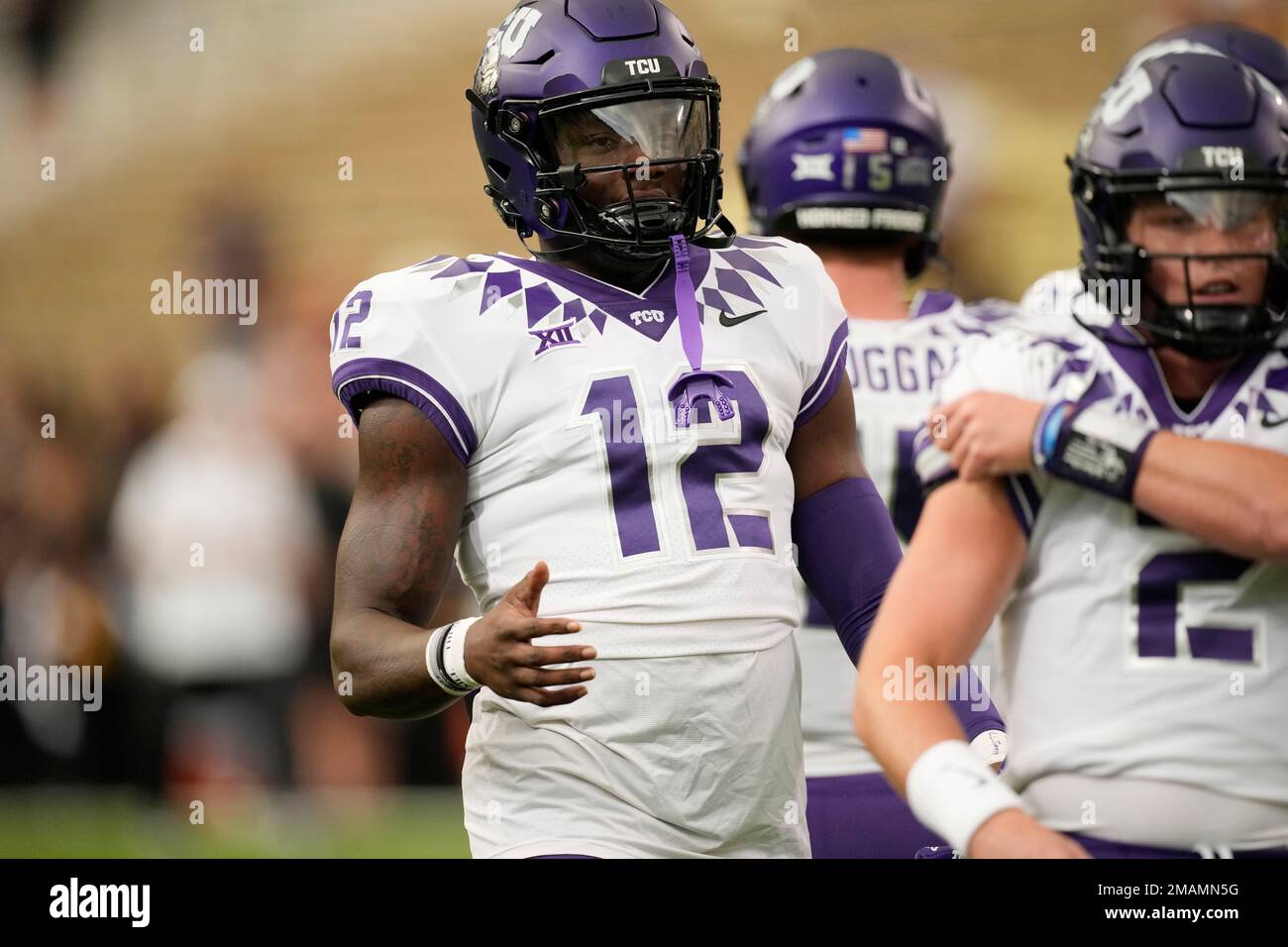 TCU tight end Geor'Quarius Spivey (12) warms up before an NCAA college ...