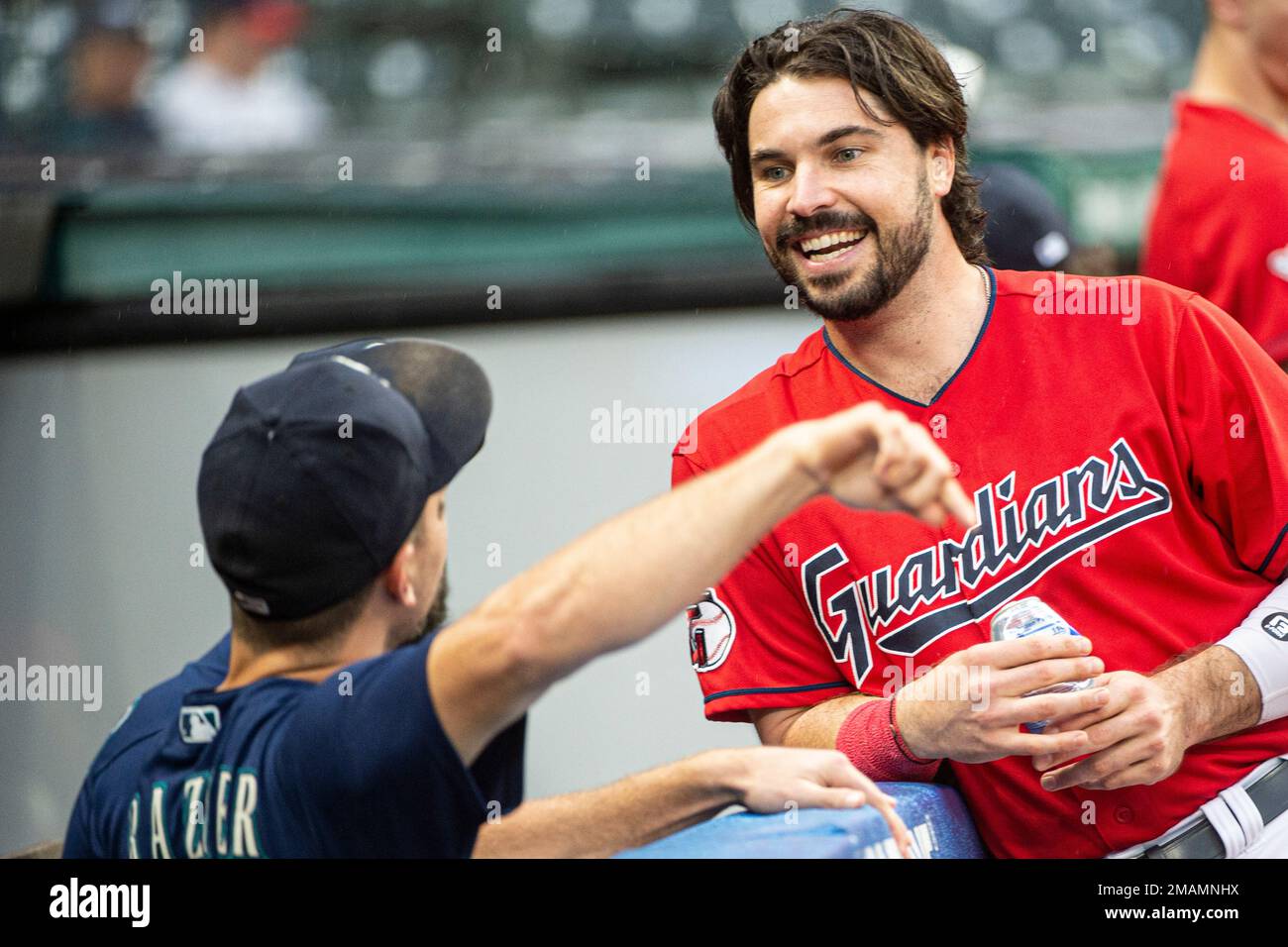 Cleveland Guardians' Austin Hedges laughs as he talks with Seattle