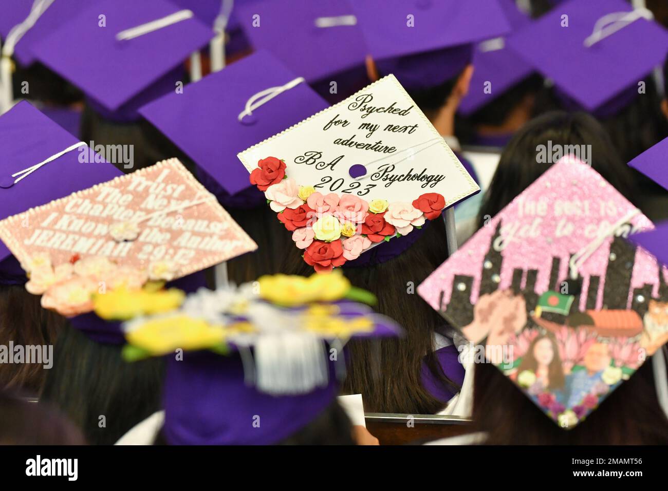 Graduates attend the Hunter College Winter Commencement on January 19