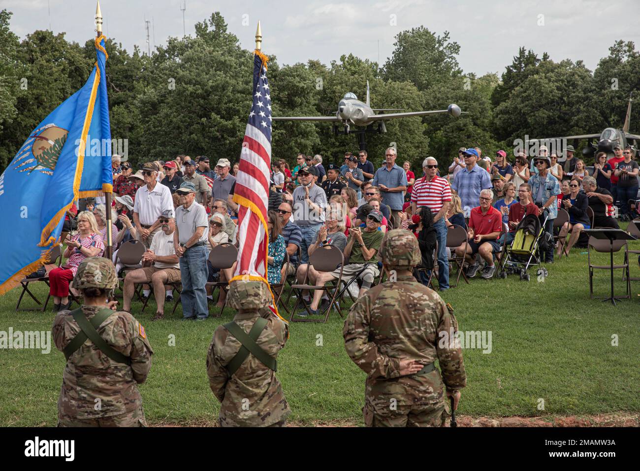 Members of the Oklahoma National Guard present the colors during a Memorial Day ceremony hosted by the 45th Infantry Division Museum in Oklahoma City, May 30, 2022. The museum has held military remembrance ceremonies since its establishment in September 1976. (Oklahoma National Guard photo by Sgt. Reece Heck) Stock Photo