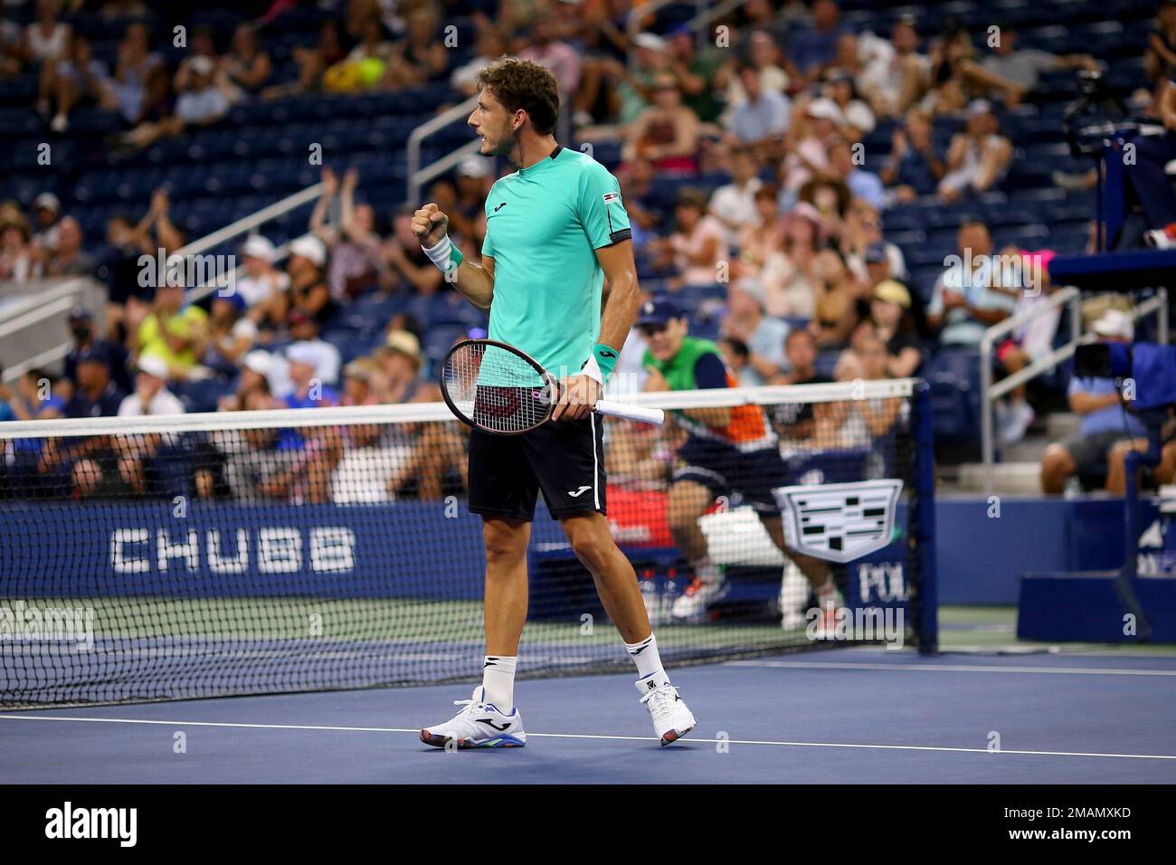 Pablo Carreno Busta, of Spain, celebrates winning a point agianast Karen Khachanov, of Russia, during the fourth round of the U.S. Open tennis championships, Sunday, Sept