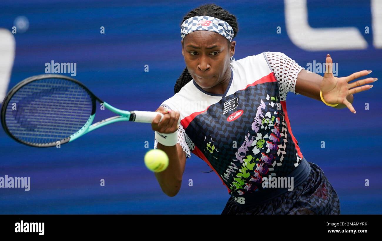 Coco Gauff, of the United States, returns to Shuai Zhang, of China,, during the fourth round of