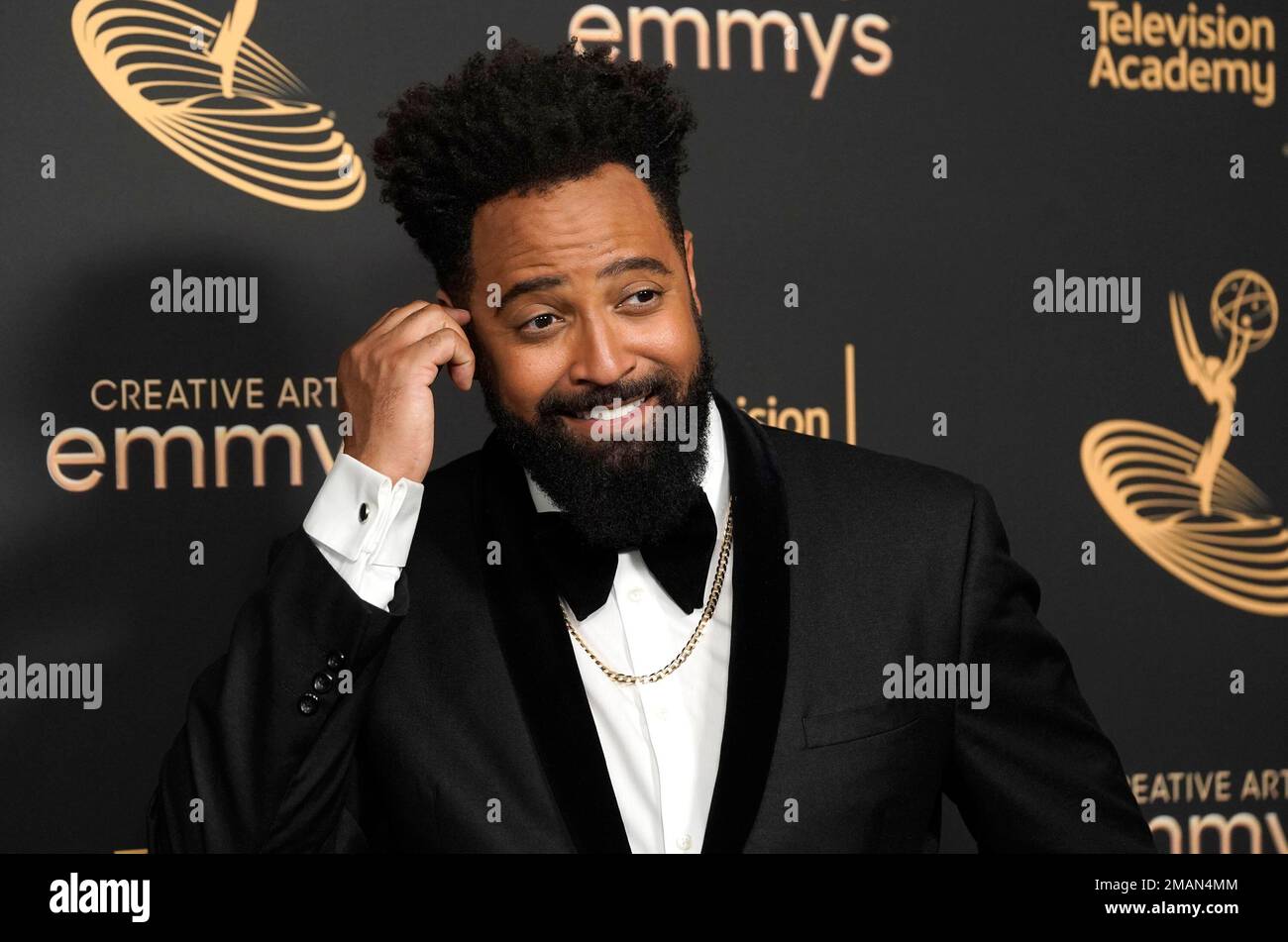 Comedian Riddle Diallo Riddle poses in the press room on night one of the Creative Arts ...