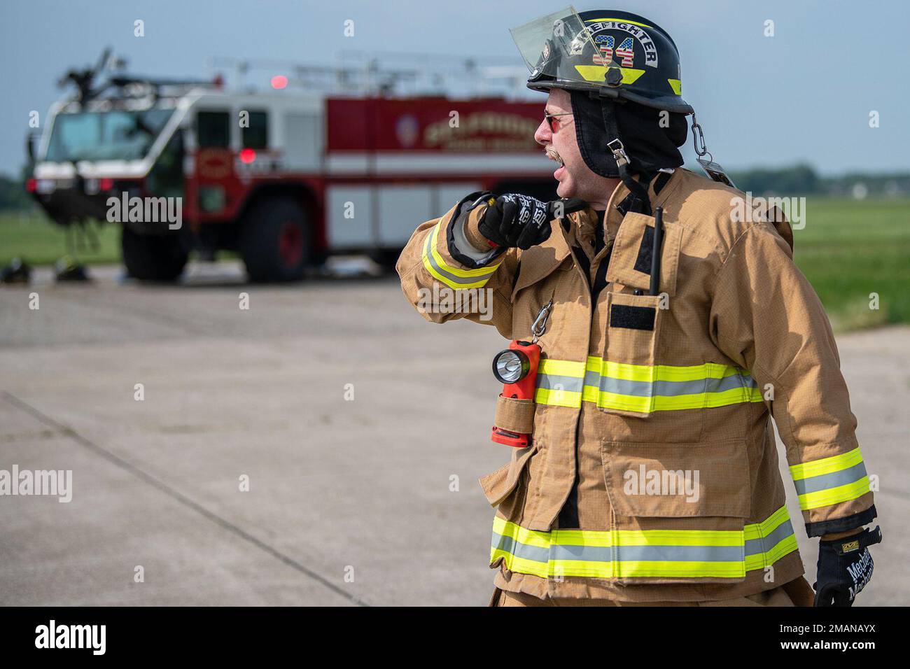 Selfridge Firefighter responds to a simulated crash site during a Major