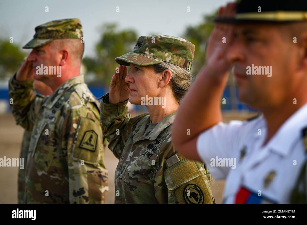 U.S. Army Maj. Gen. Jami Shawley, commanding general of Combined Joint Task Force - Horn of Africa (CJTF-HOA), renders a salute during a French Desert Commando Course graduation ceremony at the 5th Overseas Interarms Regiment, Djibouti, June 1, 2022. Members of the CJTF-HOA regularly train and work alongside allies, partners, and government organizations to achieve a unified effort to improve safety, security and prosperity in East Africa. Stock Photo