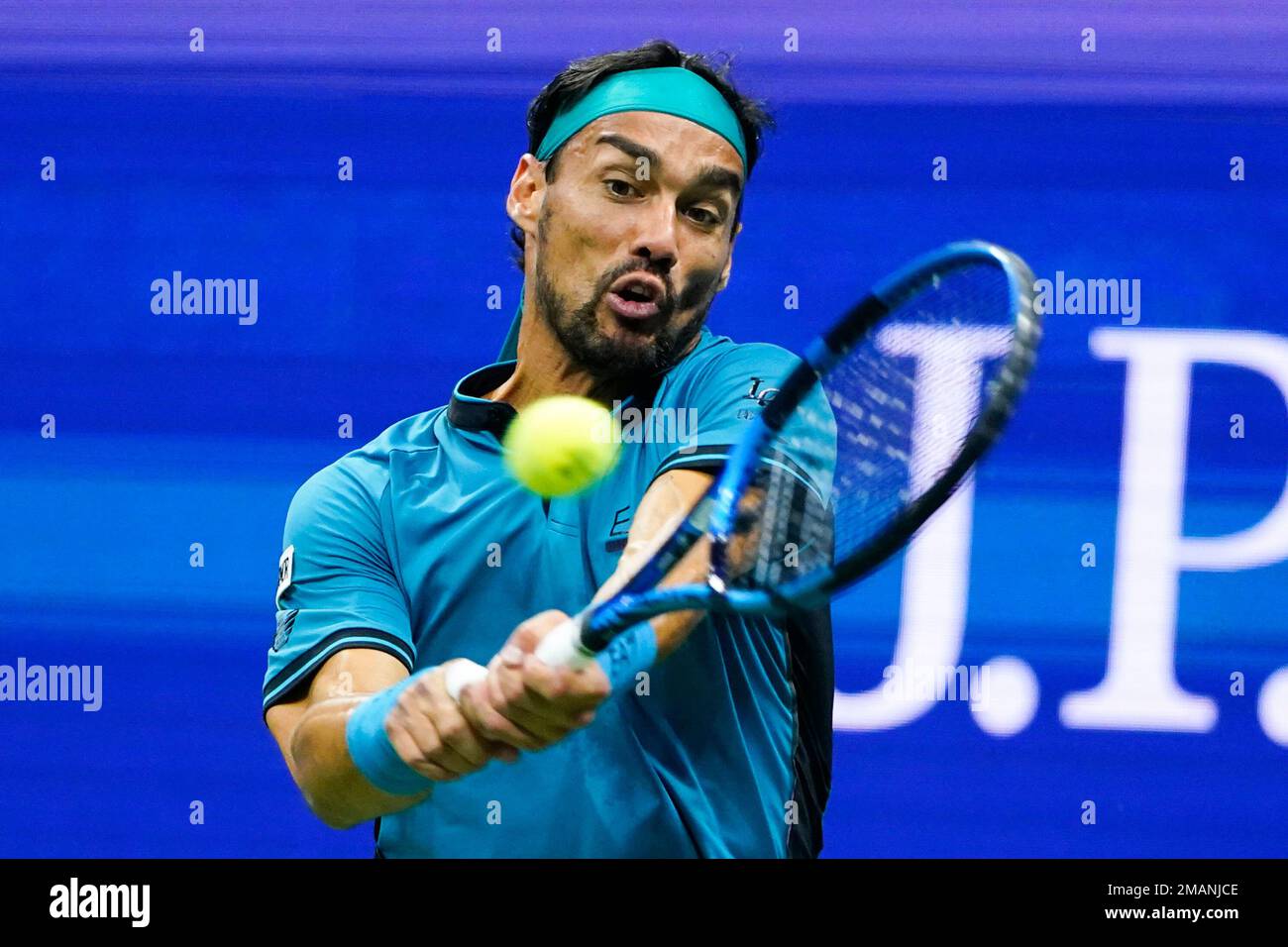 Fabio Fognini, of Italy, returns a shot to Rafael Nadal, of Spain, during  the second round of the U.S. Open tennis championships, Thursday, Sept. 1,  2022, in New York. (AP Photo/Frank Franklin