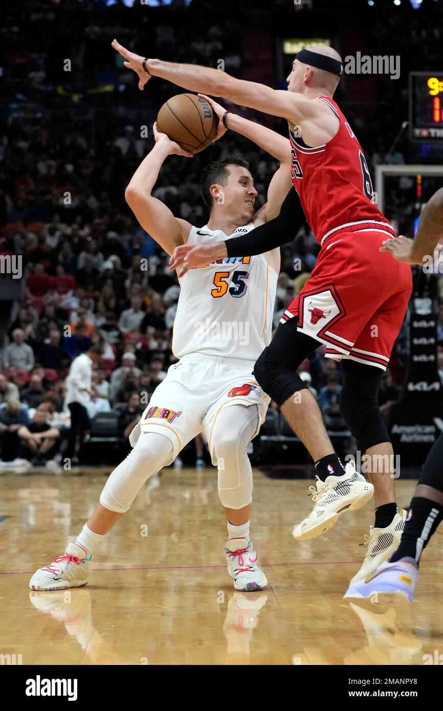 Chicago Bulls guard Alex Caruso, right, defends Miami Heat forward Duncan  Robinson (55) during the second half of an NBA basketball game, Tuesday,  Dec. 20, 2022, in Miami. The Bulls won 113-103. (