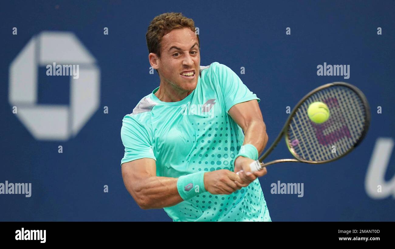Roberto Carballes Baena of Spain returns the serve during the first round  of the U.S. Open tennis tournament, Tuesday, Aug. 30, 2022, in New York.  (AP Photo/Vera Nieuwenhuis Stock Photo - Alamy