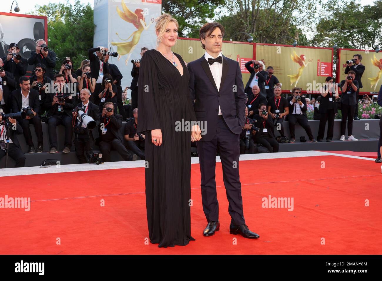 Greta Gerwig, left, and director Noah Baumbach pose for photographers