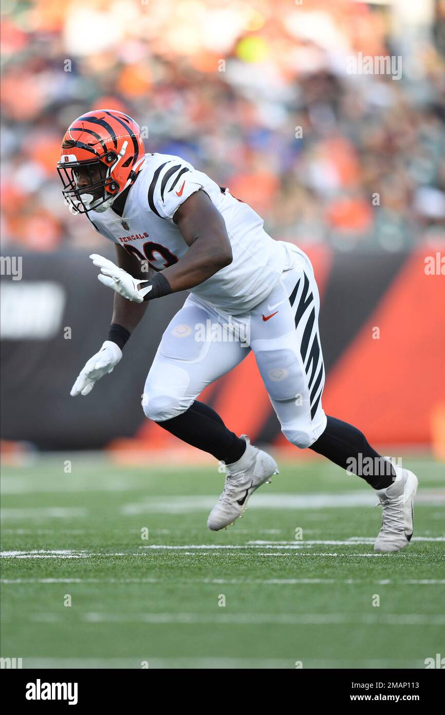 Cincinnati Bengals defensive end Jeff Gunter (93) runs for the play during  a preseason NFL football game against the Los Angeles Rams, Saturday, Aug.  27, 2022, in Cincinnati. (AP Photo/Emilee Chinn Stock