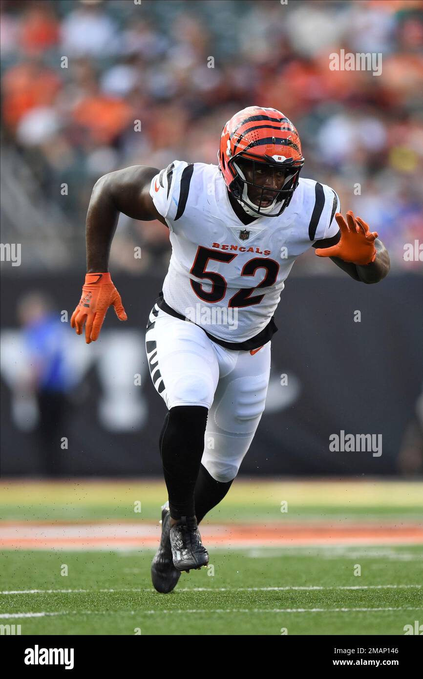 Cincinnati Bengals defensive end Noah Spence (52) runs for the play during  a preseason NFL football game against the Los Angeles Rams, Saturday, Aug.  27, 2022, in Cincinnati. (AP Photo/Emilee Chinn Stock