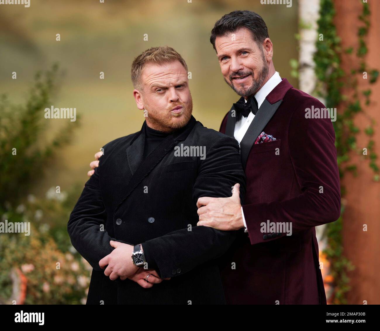 Owain Arthur, left, and Lloyd Owen pose for photographers upon their ...