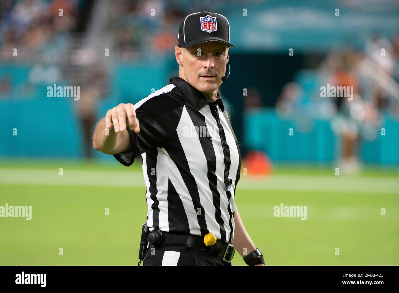 NFL down judge Dana McKenzie walks on the field during an NFL football ...