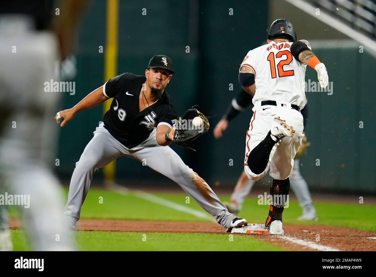 Baltimore Orioles' Rougned Odor (12) beats out a bunt single as Chicago  White Sox first baseman Jose Abreu makes the catch at first base during the  10th inning of a baseball game