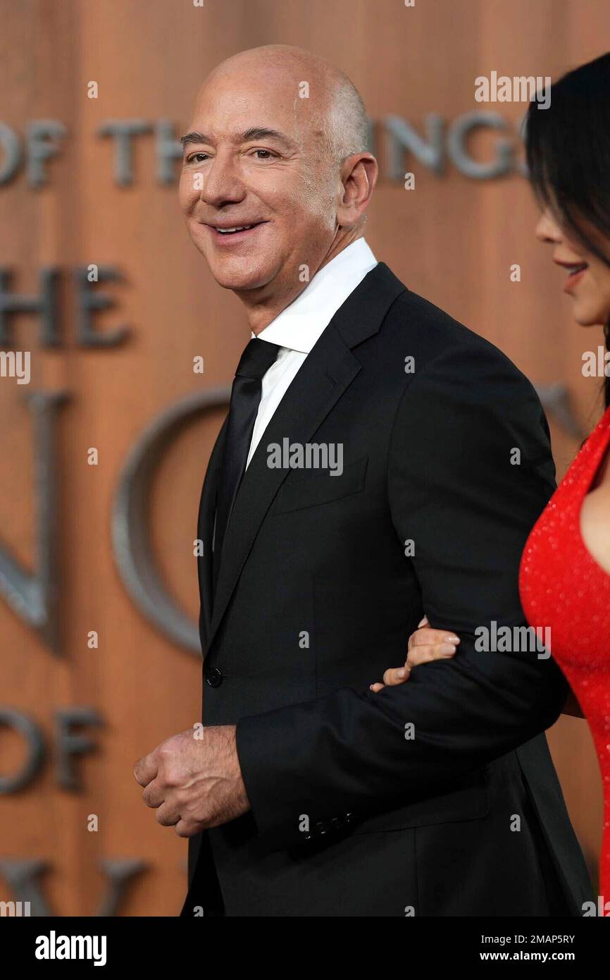 Jeff Bezos poses for photographers upon arrival for the world premiere