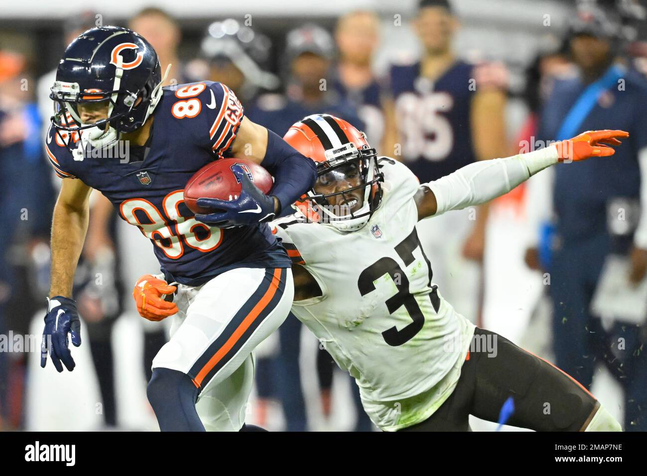 Chicago Bears wide receiver Dante Pettis (86) runs beside Cleveland Browns  safety D'Anthony Bell (37)