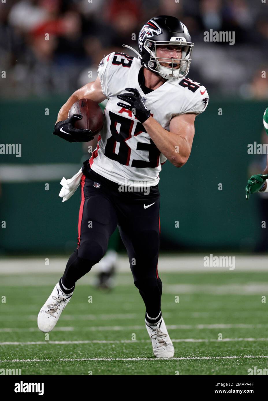 Atlanta Falcons wide receiver Jared Bernhardt (83) runs with the ball  against the New York Jets